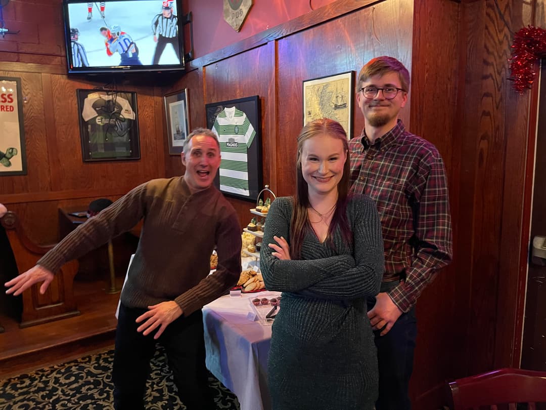 team taking photo together again